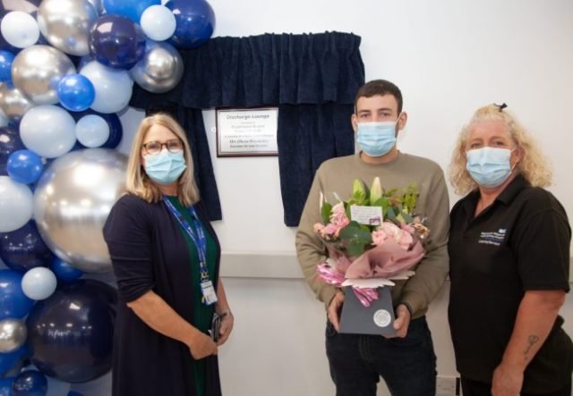 Discharge Lounge - Lloyd Winstanley, with mum, Tracey Hurst, and Deputy Chief Executive Mary Fleming (L)