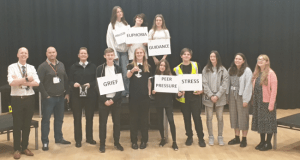 (L-R) Vice Principal, Joe Kenyon, two Merseyside police officers, students, Helen Abbot, head of Drama, and Sam Hett, teacher, with props used for the performance