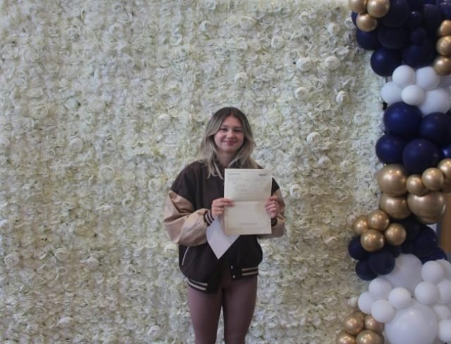 Rainford High Sixth Form's Beth Roberts with her results