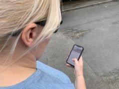 LCCStockReportingPotholeOnPhone