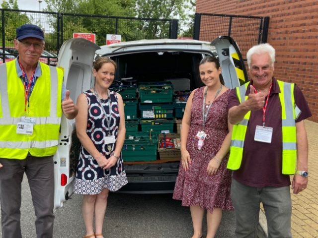 (L-R centre) Carrie Andrews and Alex Marsh with foodbank volunteers